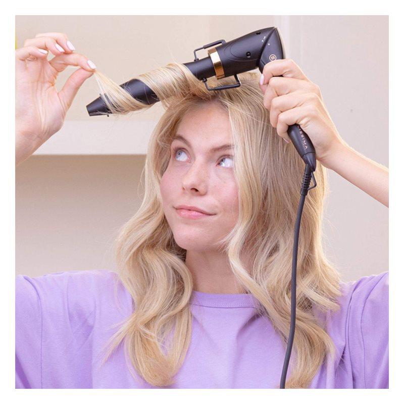 Elliptical clearance curling wand